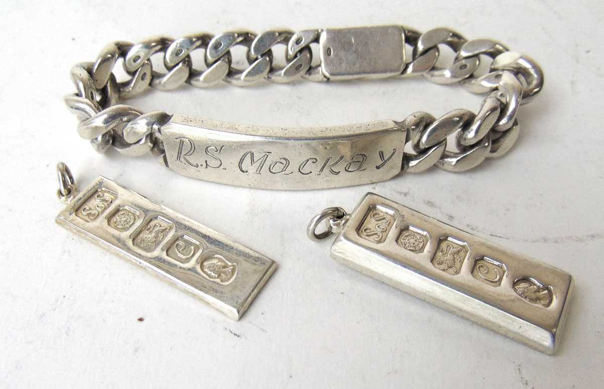 A silver curb identity bracelet, Adie Bros, Birmingham 1961, and two silver ingot pendants, SoS,