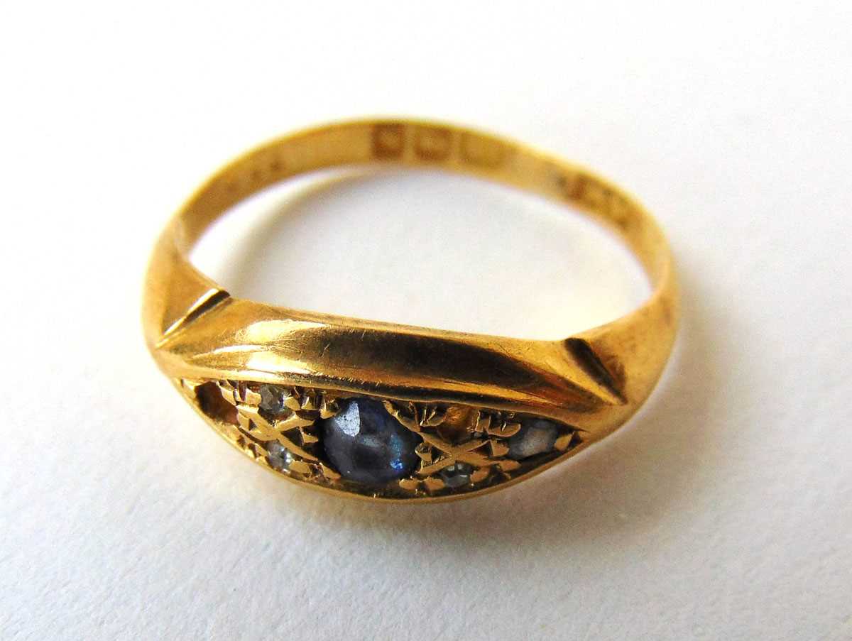 An early 20th century 18ct gold, diamond and sapphire ring. Size L. Approx. weight 3.2g A/F