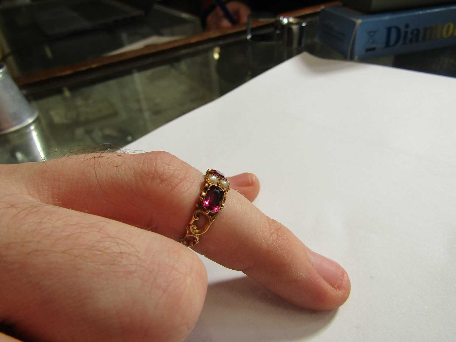 A mid Victorian 15ct gold, almandine garnet and pearl ring with openwork scrolling shoulders and - Bild 8 aus 8