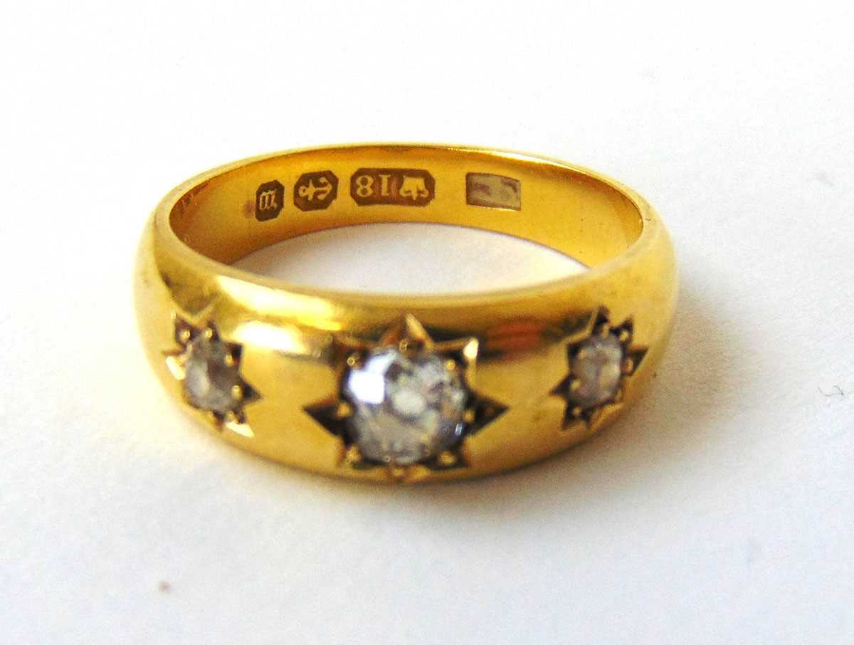 A Victorian 18ct gold and three stone diamond gypsy ring, the approximately 0.25ct central old cut - Image 2 of 2