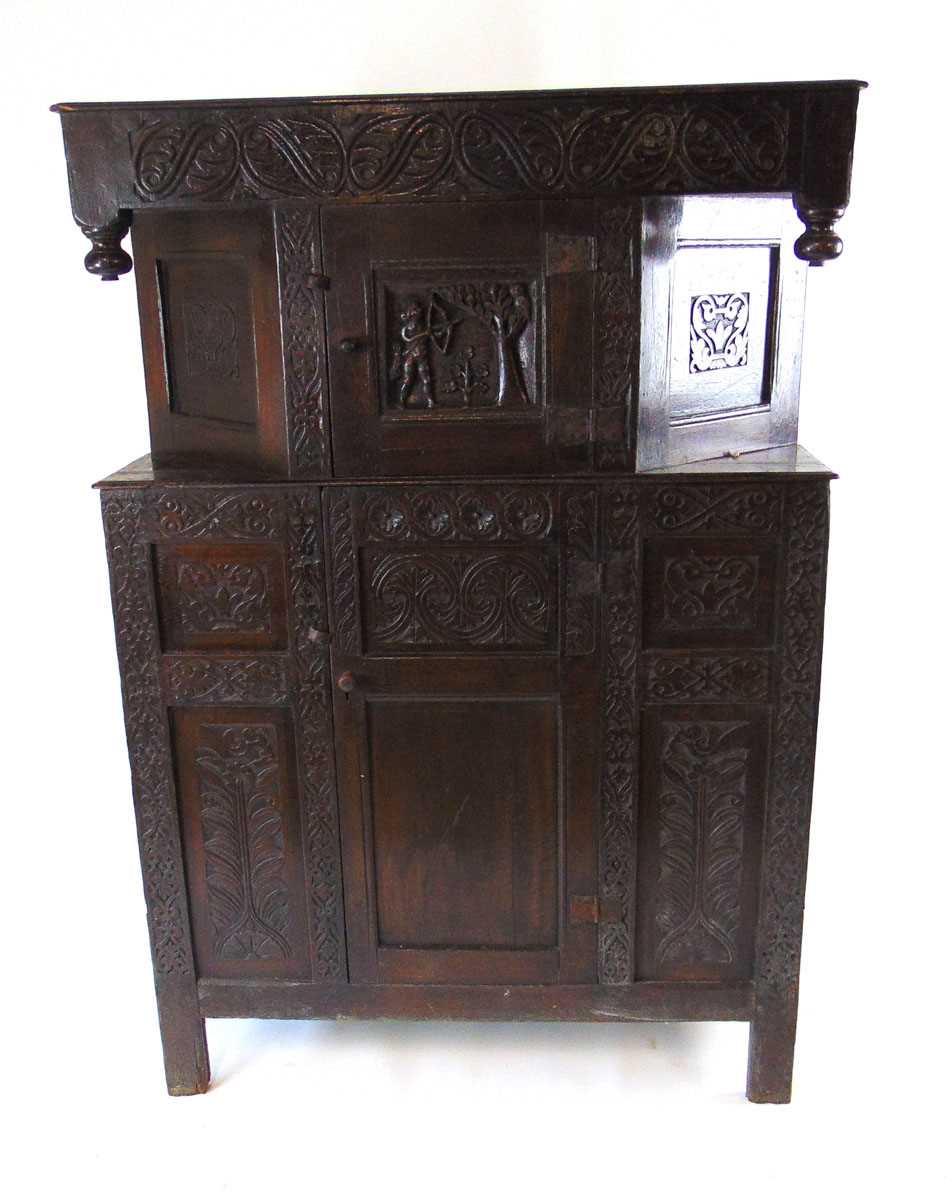 A 17th/18th century oak court cupboard, with stylised carved leaf frieze flanked by turned pendants, - Image 2 of 5