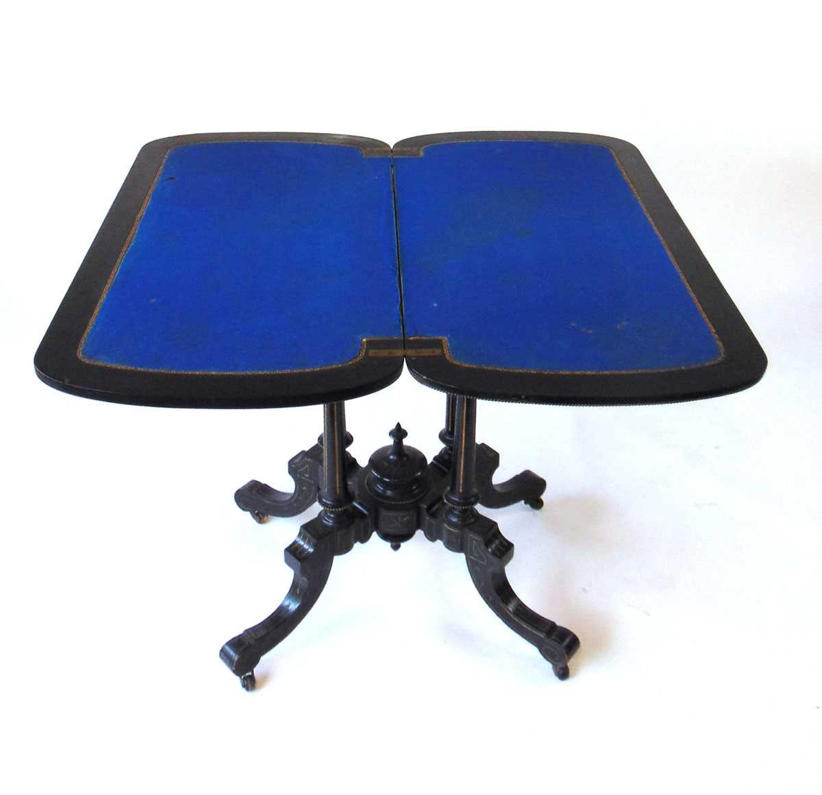 An Aesthetic period ebony and amboyna veneered card table, the top with shallow carved bellflower - Image 4 of 7