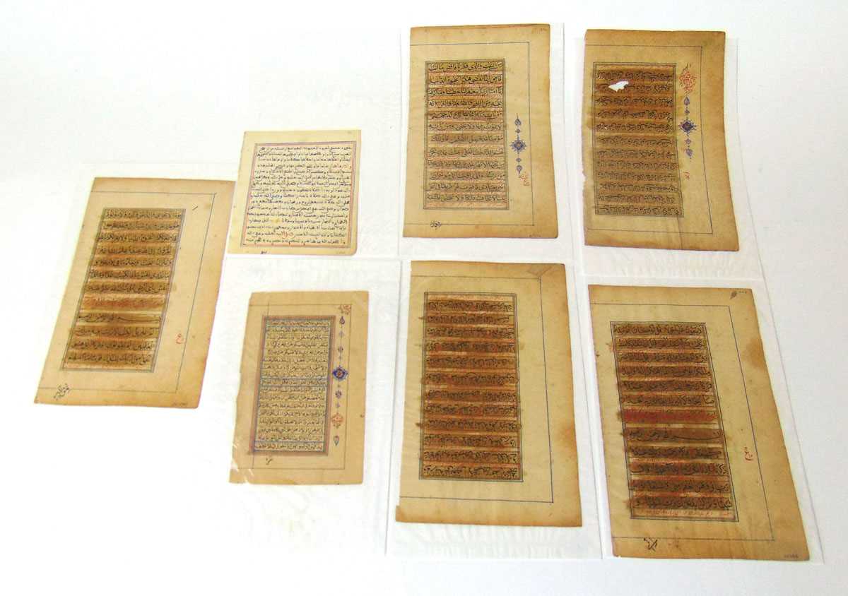 Seven loose pages of the Quran, probably 19th century, each ink inscribed, three with decorations