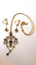 An Edwardian yellow metal, amethyst and seed pearl pendant marked '9ct'. Together with a pair of