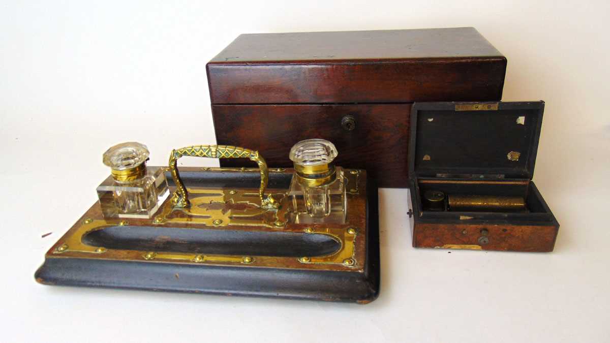 A Scotcher & Son music box, in walnut case, label to underside, a Victorian rosewood veneered tea