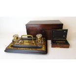 A Scotcher & Son music box, in walnut case, label to underside, a Victorian rosewood veneered tea