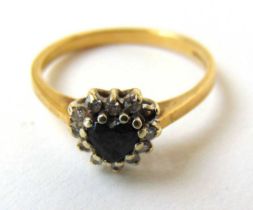 A 9ct gold, heart shaped sapphire and diamond cluster ring. Size N 1/2. Approx. weight 2g. A/F