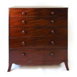 An early 19th century mahogany chest of drawers, with two short over four long graduated oak lined