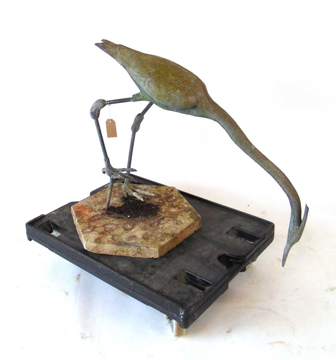 A life size lead Heron garden ornament, modelled facing downwards, on a concrete base, 88cm wide , - Image 3 of 4