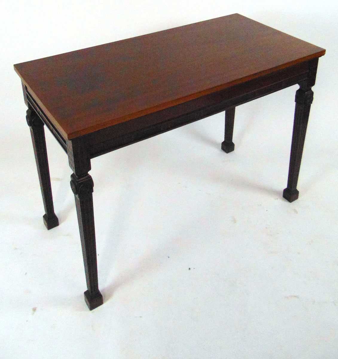 An Edwardian classical revival mahogany side table, of rectangular form, on square fluted legs on - Image 4 of 5