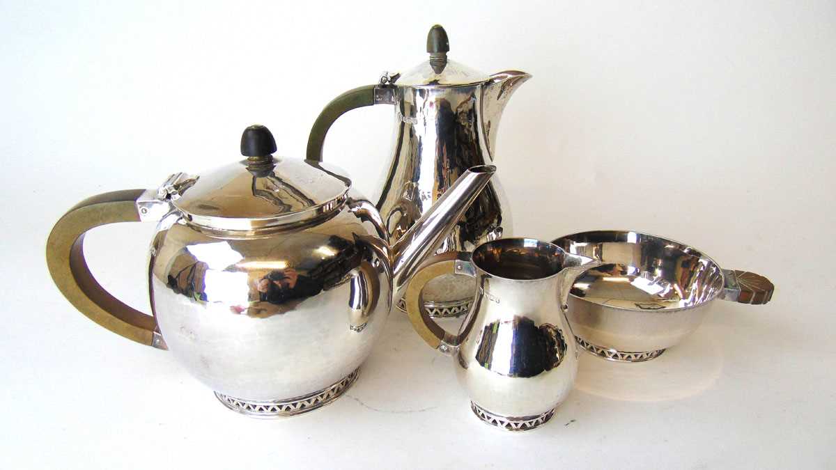 A George VI silver Arts & Crafts style four-piece tea and coffee set, the pieces having a textured - Image 2 of 2