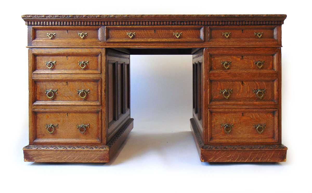 A late Victorian oak partners desk, with green tooled leather writing surface, above a series of - Image 2 of 15