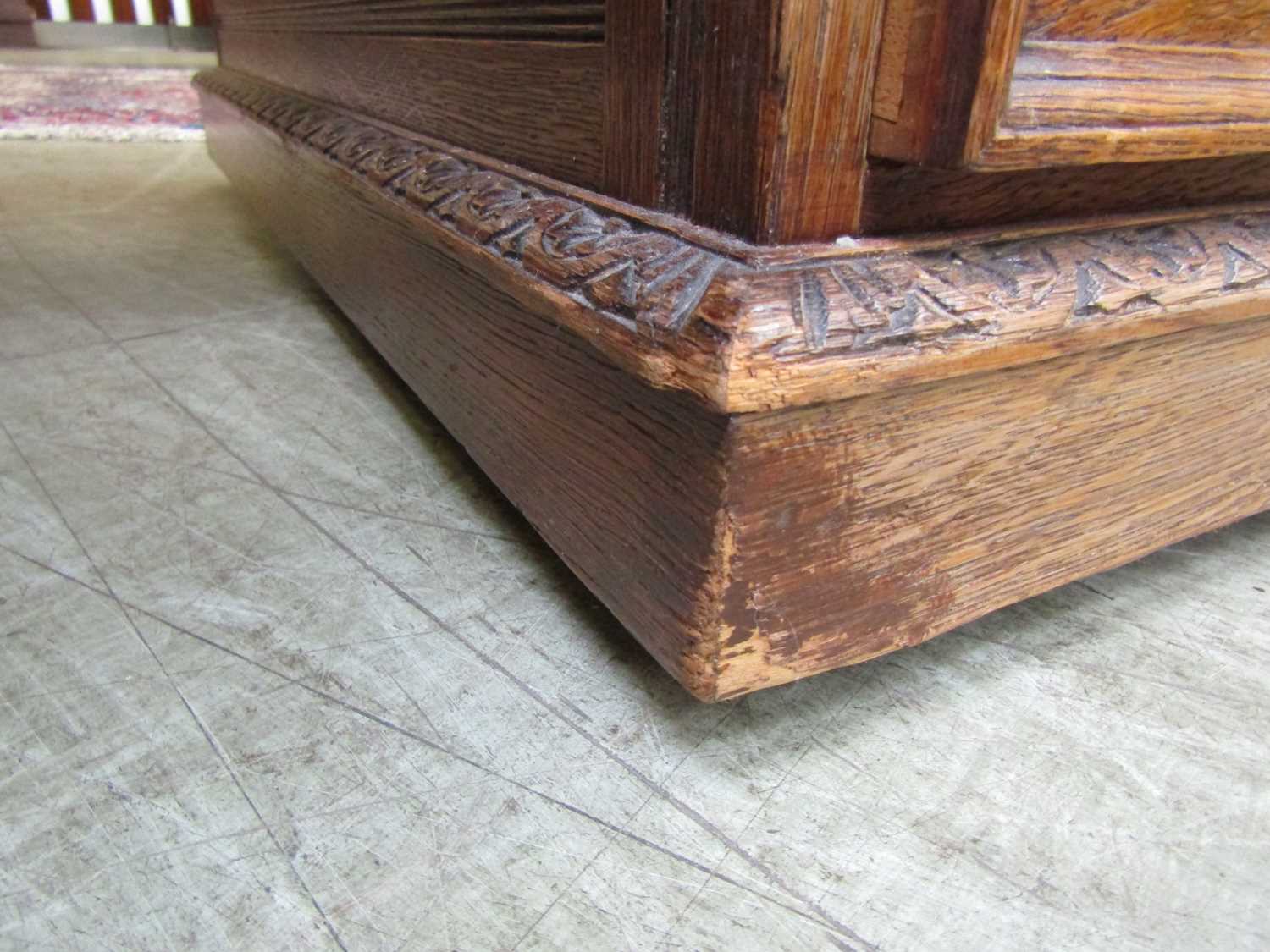 A late Victorian oak partners desk, with green tooled leather writing surface, above a series of - Image 13 of 15