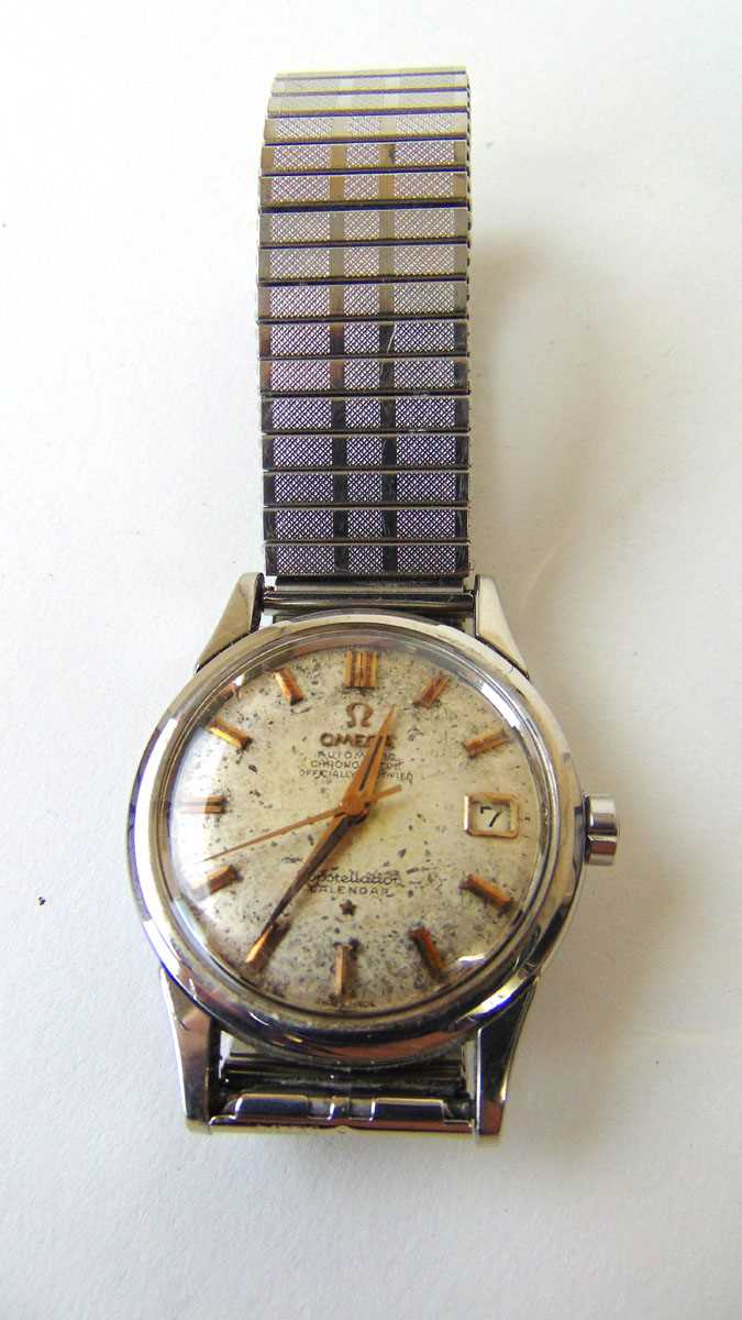 A gentleman's Omega Automatic Constellation Calendar wristwatch, the stainless steel case with