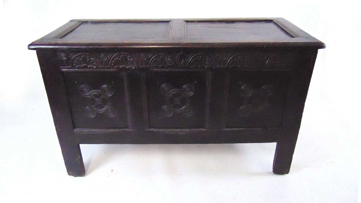 An early 18th century carved oak coffer, with foliate arcaded frieze above three carved panels, on - Image 2 of 5