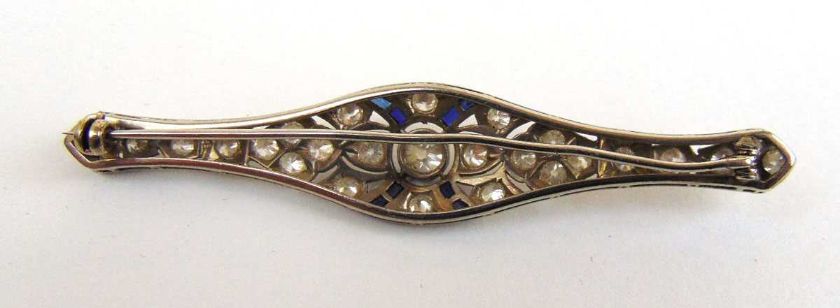 An early 20th century diamond and sapphire bar brooch. Total diamond weight estimated in excess of - Image 2 of 3