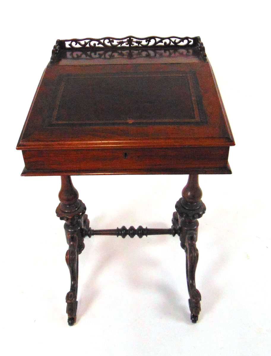 A Victorian rosewood Davenport, with fretwork gallery above a tooled red leather writing surface, - Image 2 of 7