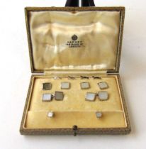 A set of 9ct white gold and mother of pearl cufflinks, dress buttons and collar studs, makers