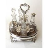 A Victorian silver seven bottle cruet stand, John Evans II, London 1846, with gadrooned rim on C