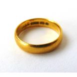 A 22ct gold wedding band. Size Q. Approx. weight 5.9g