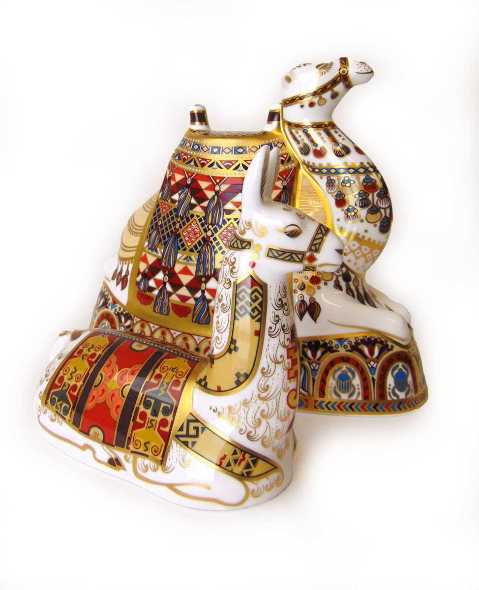 Two Royal Crown Derby Imari paperweights, modelled as a seated Camel and a Llama, each with a gold