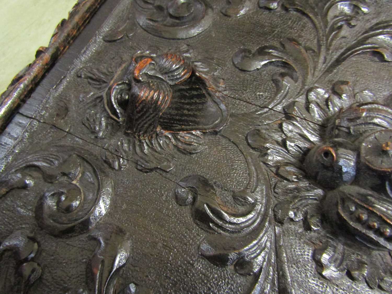 A late Victorian carved and ebonised oak purdonium/seat, decorated with carved masks, foliate - Image 11 of 14