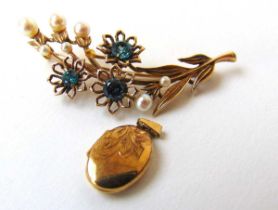 A yellow metal, pearl and topaz flower brooch together with a small locket marked '9ct'. Approx.