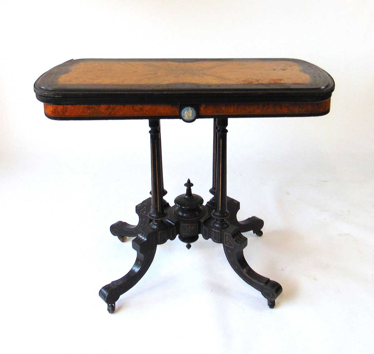 An Aesthetic period ebony and amboyna veneered card table, the top with shallow carved bellflower - Image 2 of 7