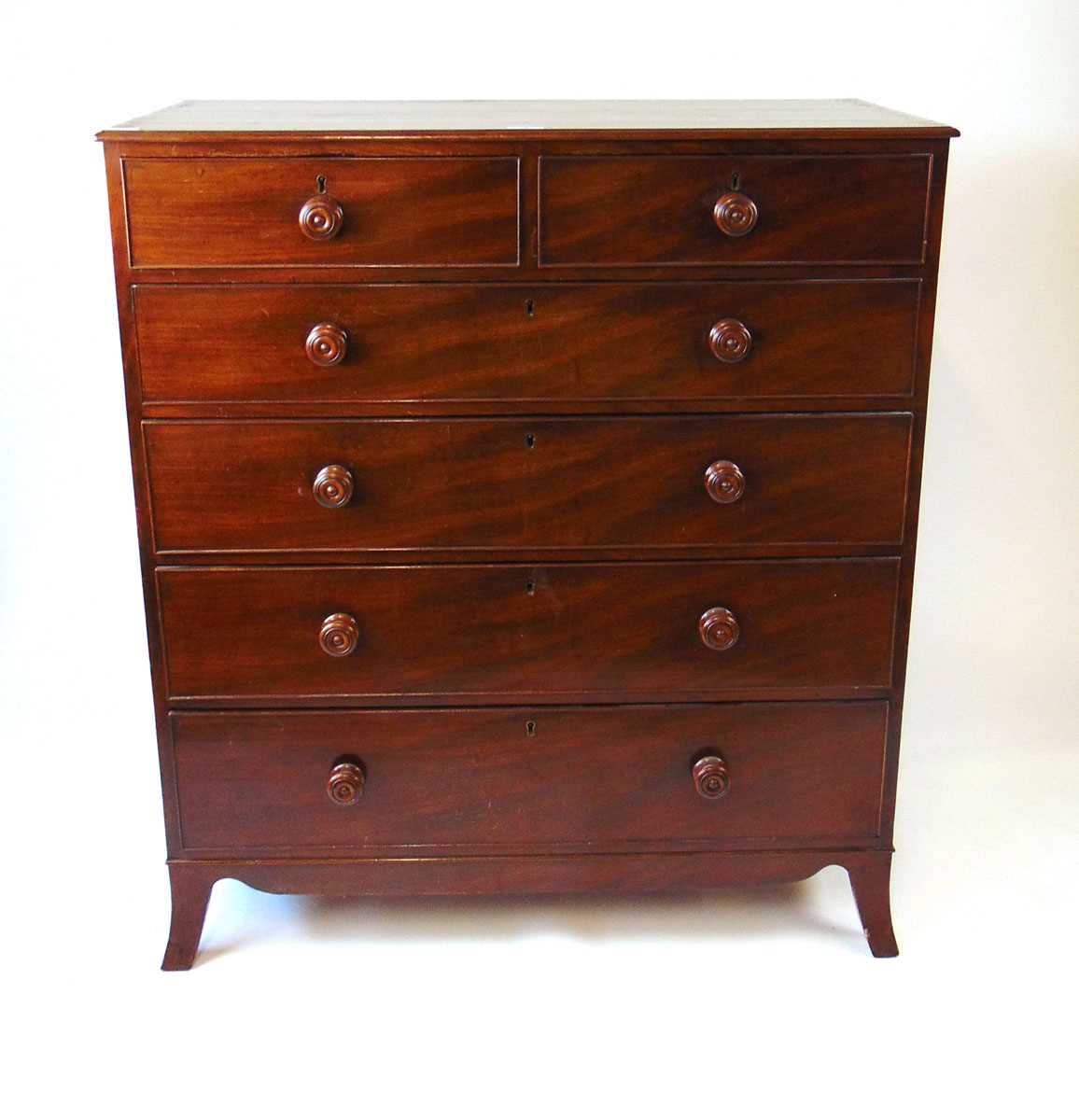 An early 19th century mahogany chest of drawers, with two short over four long graduated oak lined - Image 2 of 6