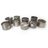 Nine sterling silver napkin rings, various dates & makers, 289g