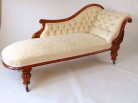 A Victorian chaise longue with matching armchair en-suite, each with mahogany show frame, with