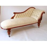 A Victorian chaise longue with matching armchair en-suite, each with mahogany show frame, with