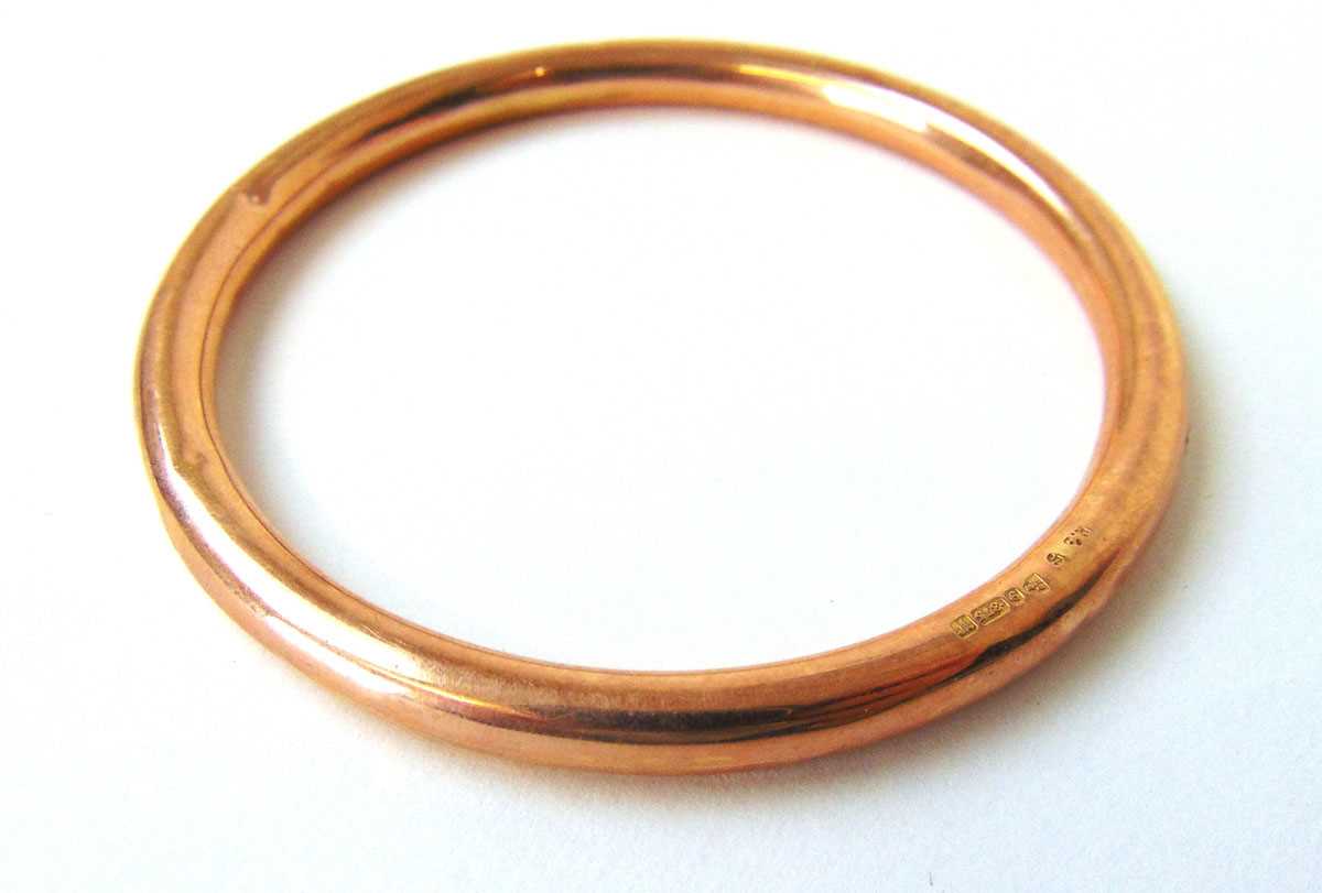 An early 20th century 9ct rose gold bangle. Approx. weight 10.5g