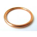 An early 20th century 9ct rose gold bangle. Approx. weight 10.5g