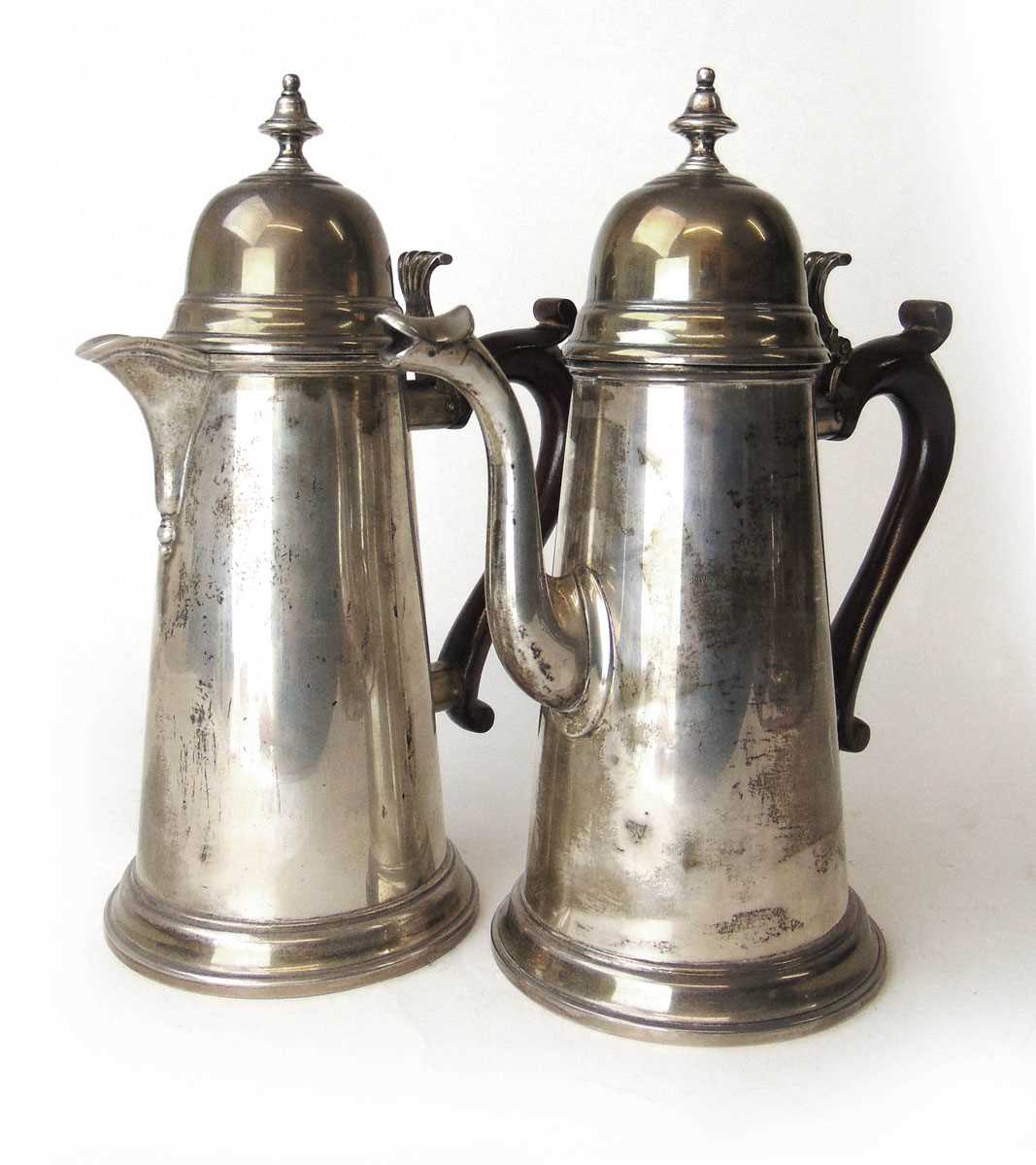 An Elizabeth II silver coffee pot together with a matching silver teapot. Hallmarked for London