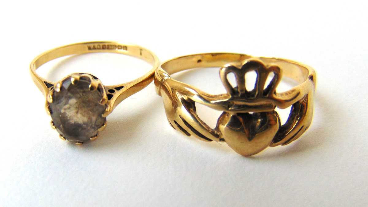 A 9ct gold and smokey quartz dress ring together with a 9ct gold Claddagh ring. Approx. weight 5.3g