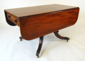 A 19th century mahogany and crossbanded breakfast table, the drop leaves with rounded corners,