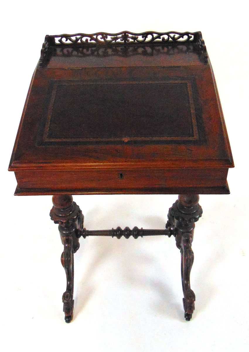 A Victorian rosewood Davenport, with fretwork gallery above a tooled red leather writing surface, - Image 3 of 7