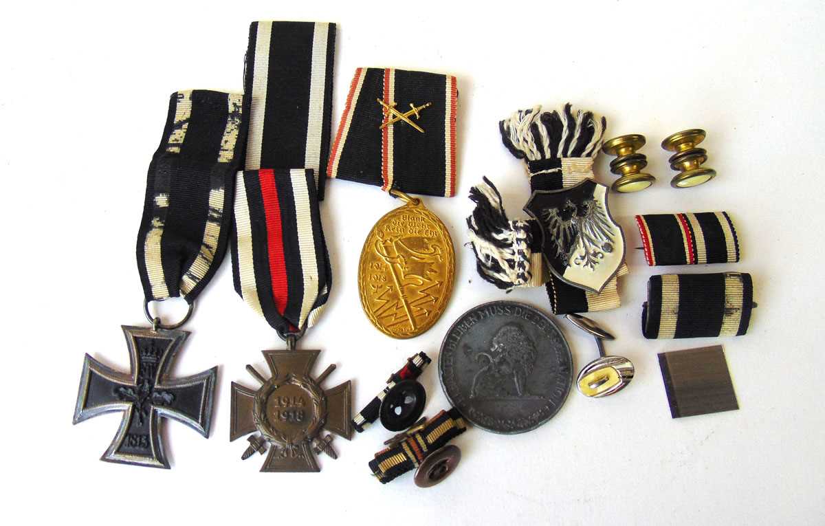 A small collection of German first world war military awards, comprising an original early 20th