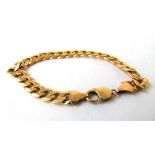 A 9ct gold curb link bracelet. Approx. weight 23.7g