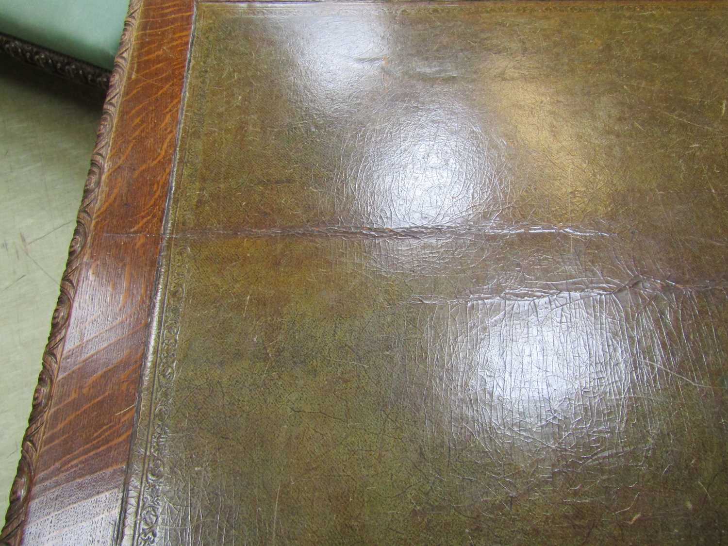 A late Victorian oak partners desk, with green tooled leather writing surface, above a series of - Image 9 of 15