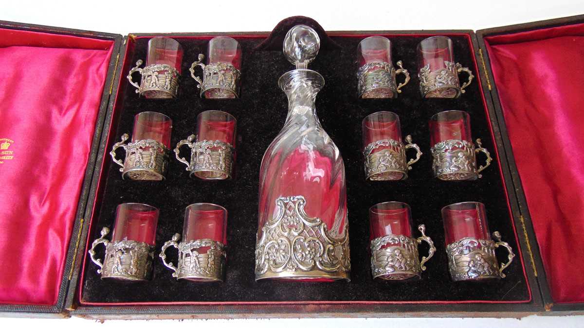 A late Victorian silver mounted liqueur set, the decanter with wythen body, the plain glasses with - Image 2 of 7