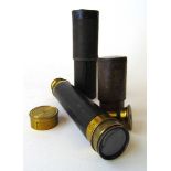 A small brass and leather bound three drawer pocket telescope, with lacquered brass end cap and a