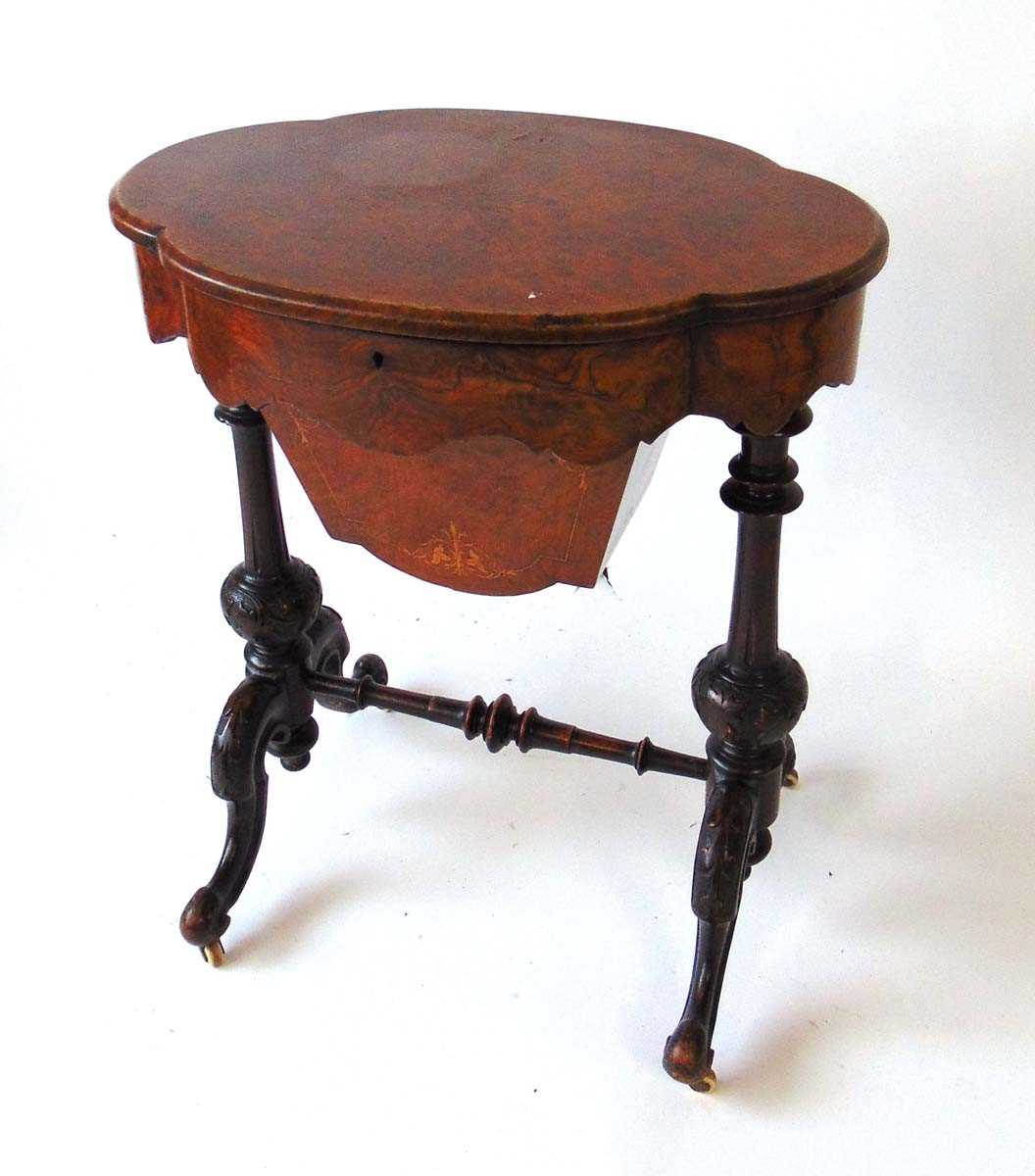 A Victorian walnut work table, the well figured book matched veneered top opening to reveal a fitted - Image 2 of 4