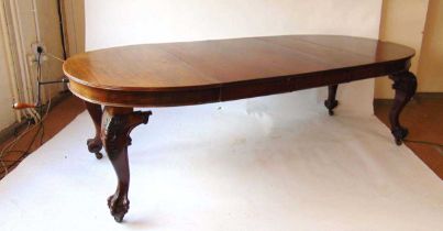 A late Victorian mahogany extending dining table, circa 1900, with Joseph Fitter patent winding