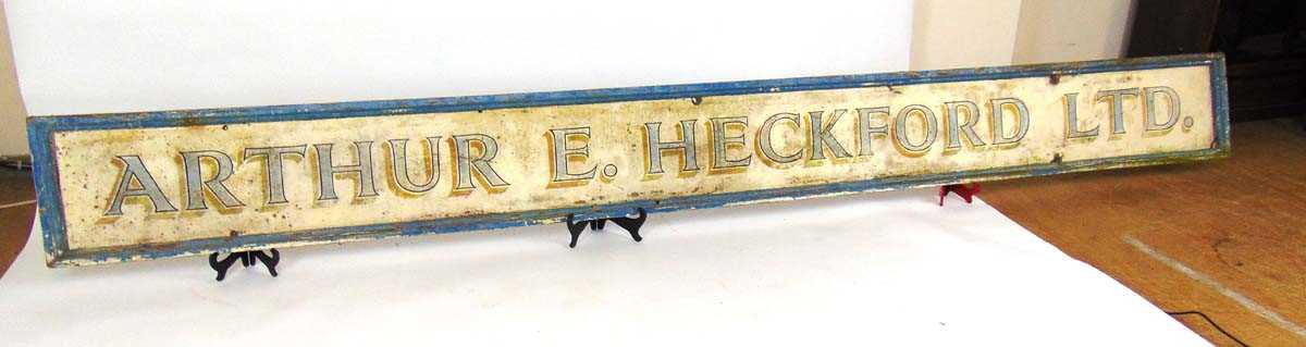 A large painted wood shop sign advertising 'Arthur E Heckford Ltd', 350cm x 35.5cm Graces Guide - Image 3 of 4
