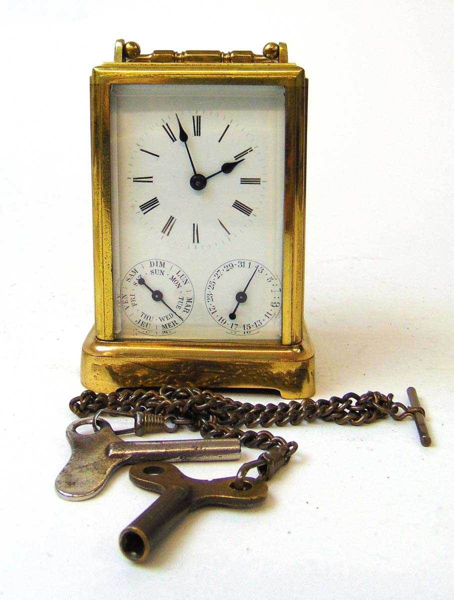 A French brass cased calendar carriage clock timepiece, late 19th/early 20th century, with