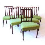 A set of six 19th century mahogany Hepplewhite style dining chairs, the reeded back rails with