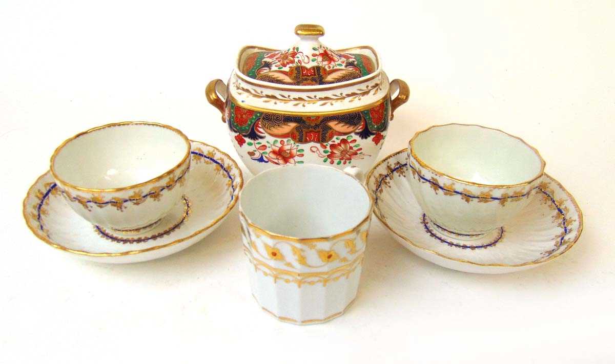 Two Derby porcelain tea bowls and saucers, late 18th century, one with spiral moulded fluting with