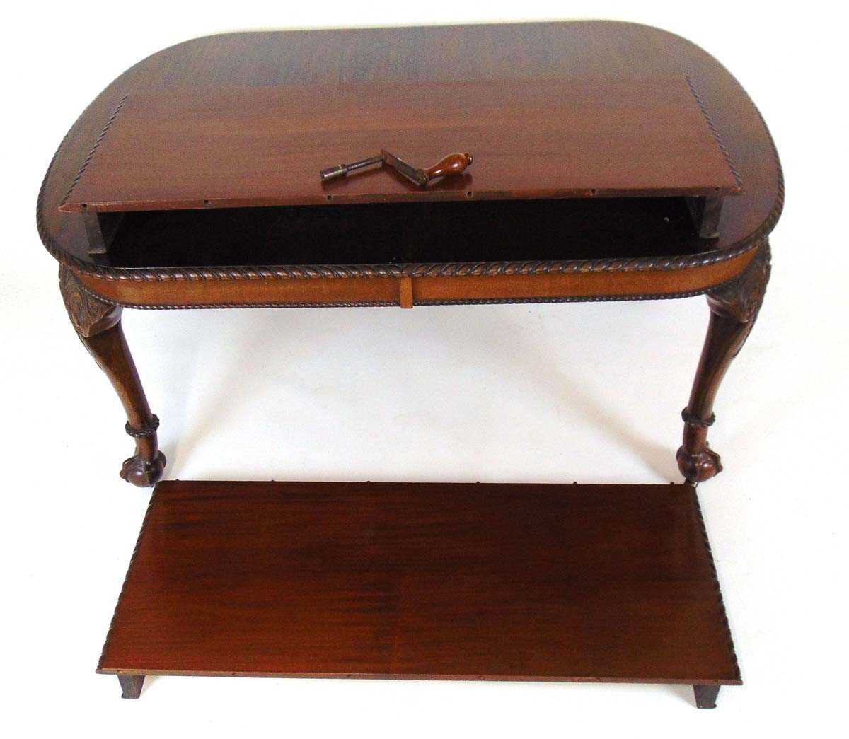 A mahogany extending dining table, early 20th century, with carved gadrooned edge, supported on four - Image 9 of 11